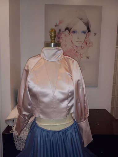 Expert alteration — pink satin bodice fitting